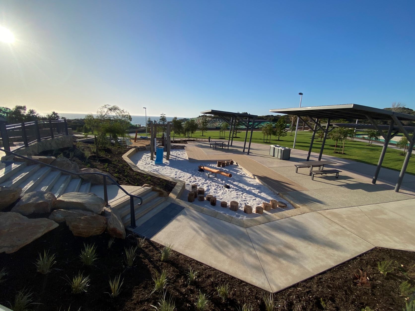 A view of the playground at Capricorn Beach, showcasing the vibrant play area and recreational facilities.
