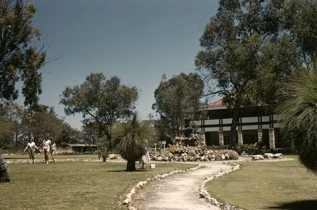 Yanchep From Then to Now A historic photo of Yanchep land showing visitors walking along a garden path