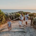 Family enjoying a coastal walk at Capricorn Beach Yanchep with ocean views